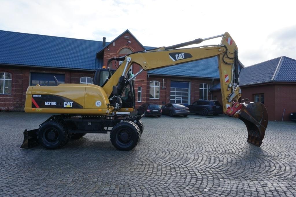 CAT M 318 D Bageri na kotačima