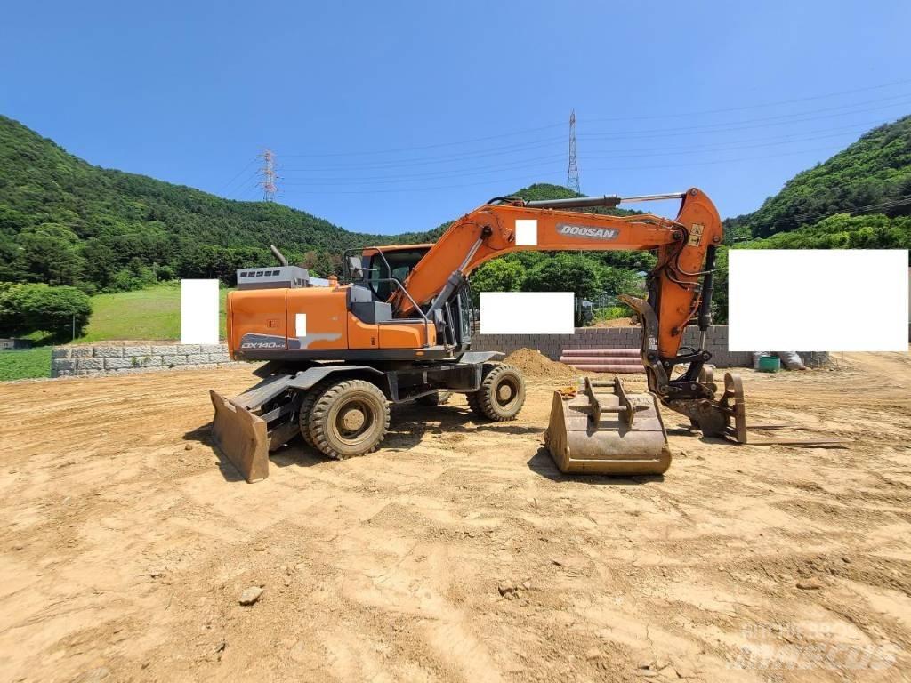 Doosan DX 140 W Bageri na kotačima