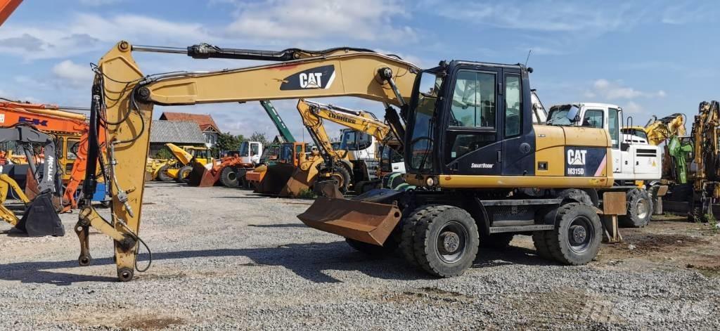 CAT M 315 D Bageri na kotačima