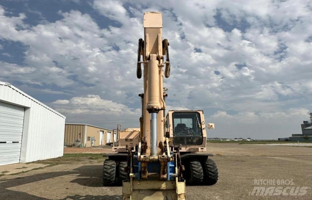 John Deere 595 Bageri na kotačima