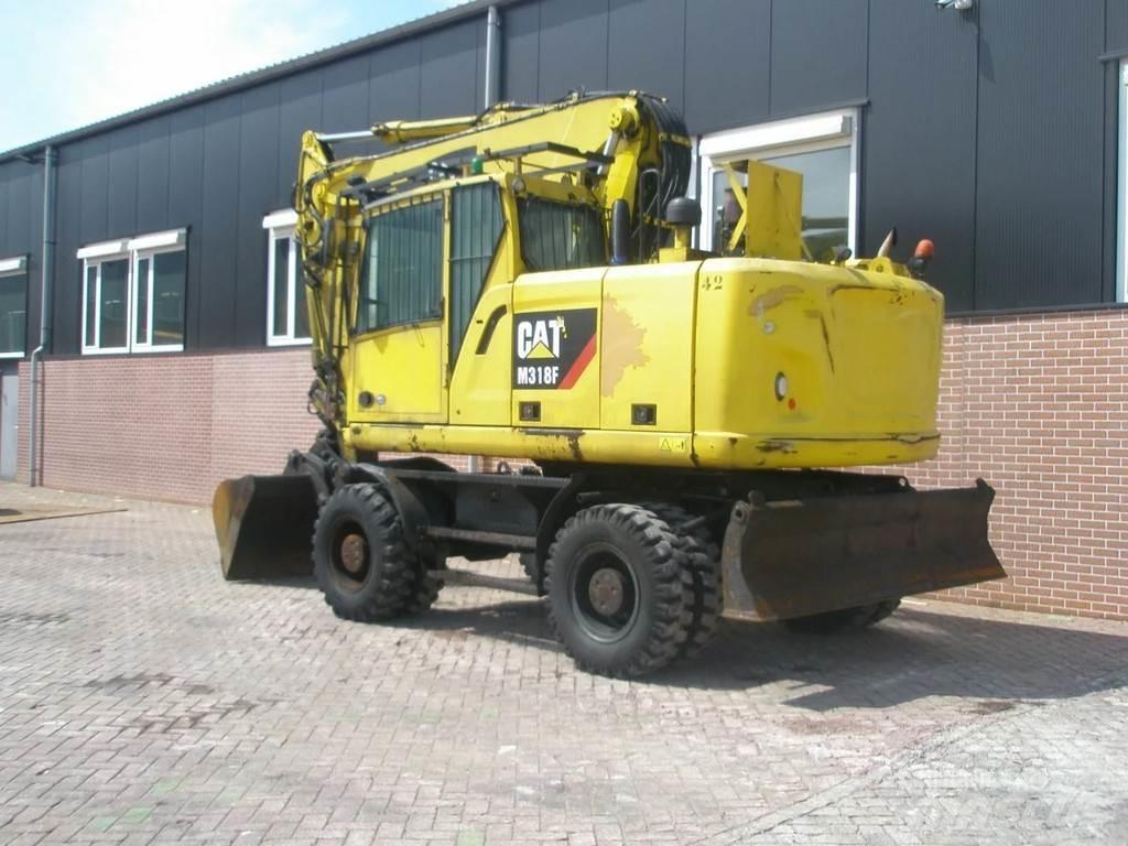 CAT M318F Bageri na kotačima