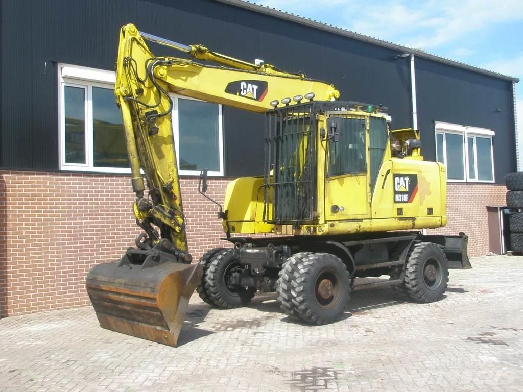 CAT M318F Bageri na kotačima