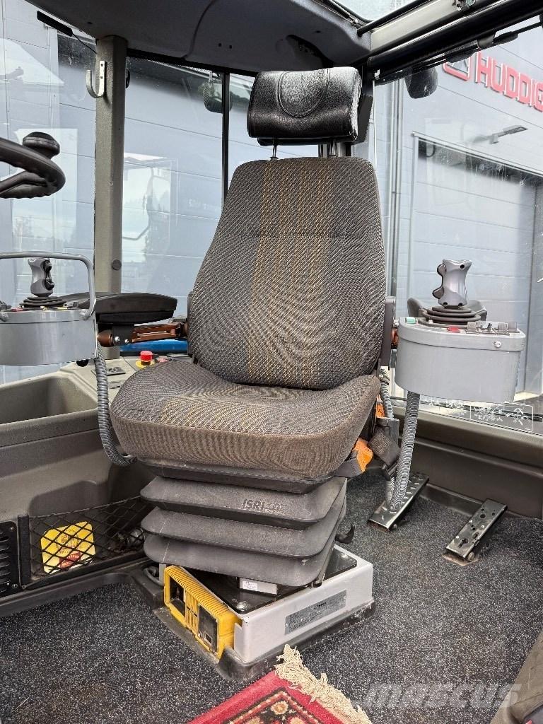 Huddig 1260 B Utovarni rovokopači