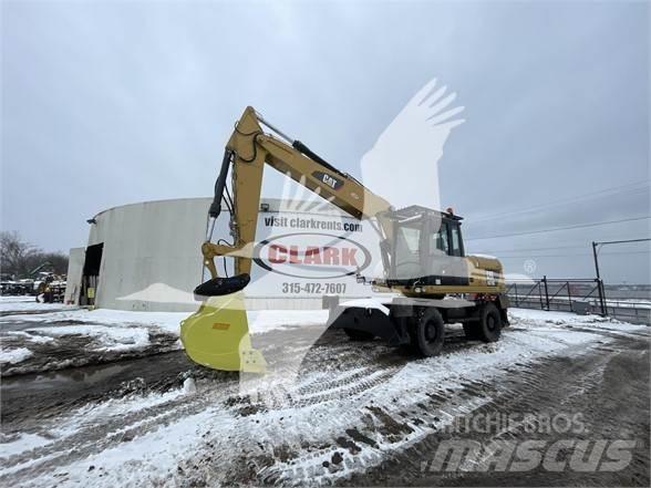 CAT M318D Bageri na kotačima