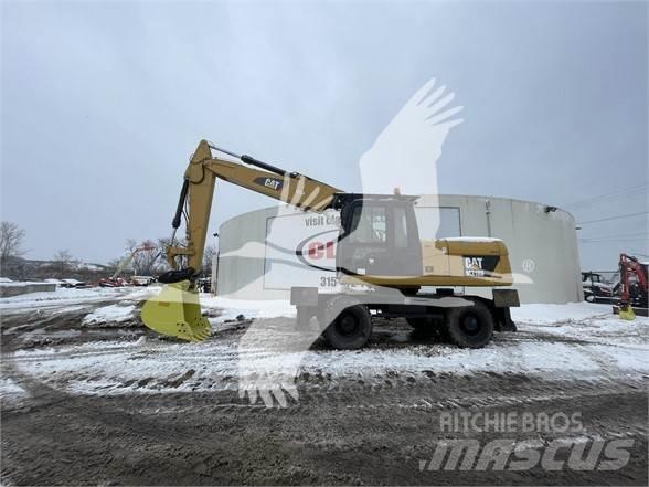 CAT M318D Bageri na kotačima