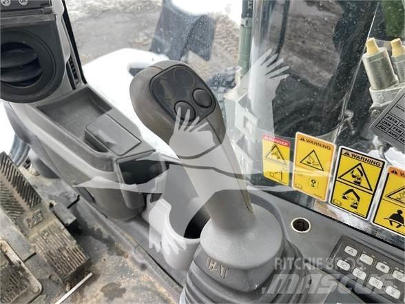 CAT M318D Bageri na kotačima