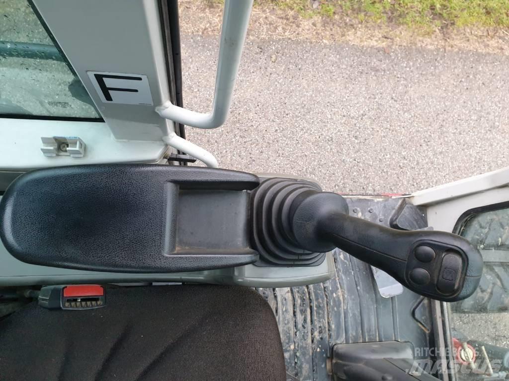 Takeuchi TB 295 W Bageri na kotačima