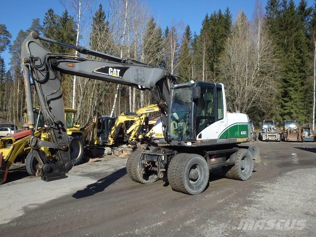 CAT M 313 C 4x4 Bageri na kotačima