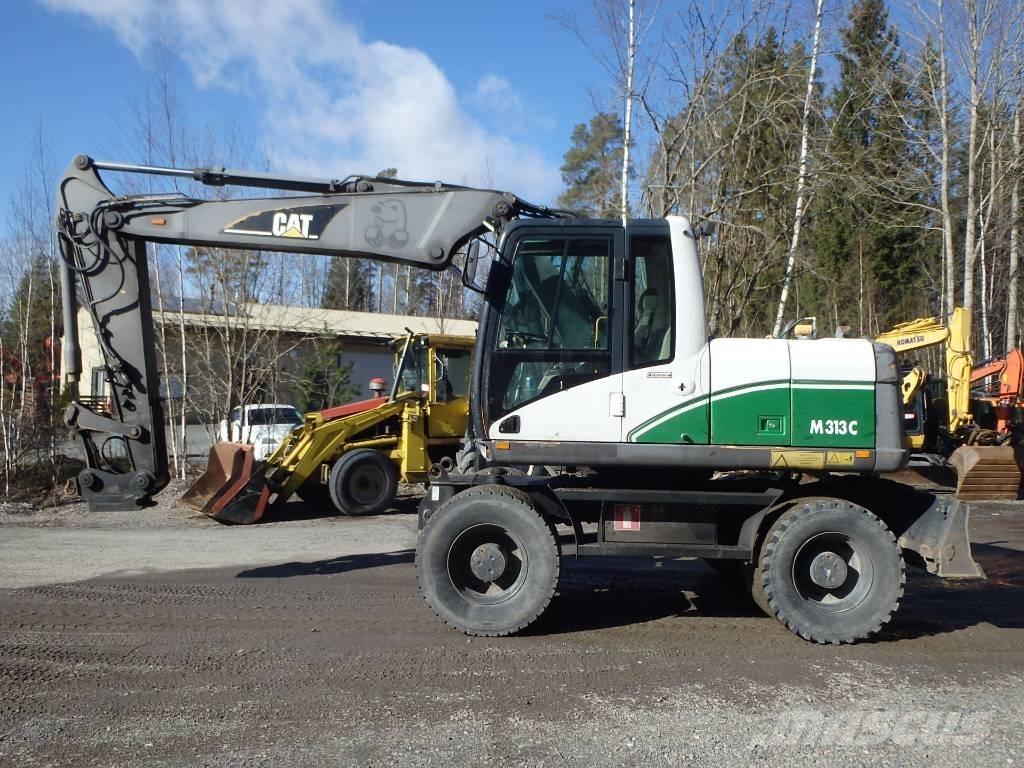 CAT M 313 C 4x4 Bageri na kotačima
