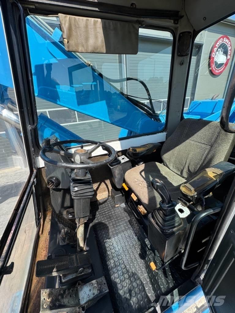 Fuchs MHL 331 Bageri za manipuliranje materijalom / otpadom