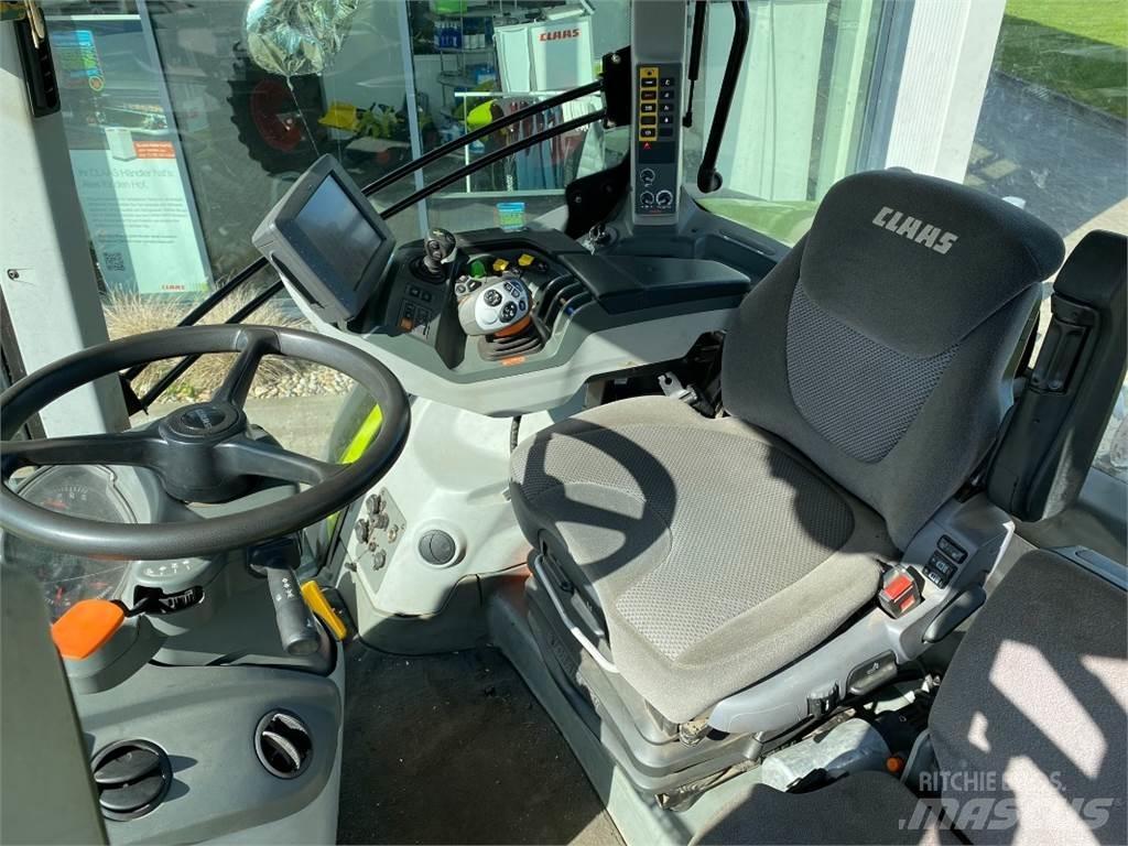 CLAAS AXION 810 Traktori