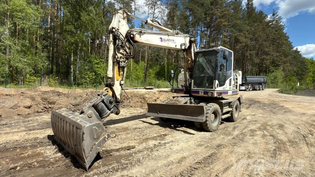 Komatsu PW 148-8 Bageri na kotačima