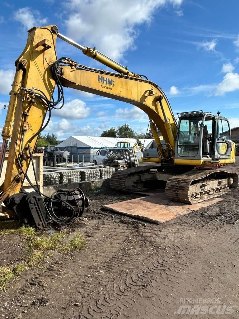 New Holland E 265 Bageri gusjeničari