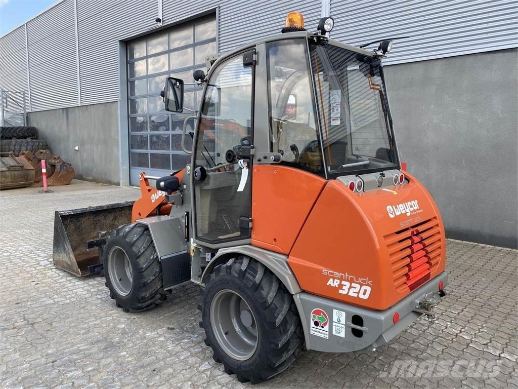 Weycor AR320 Cab Višenamjenski utovarivači