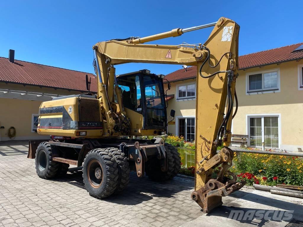 CAT M 312 Bageri na kotačima