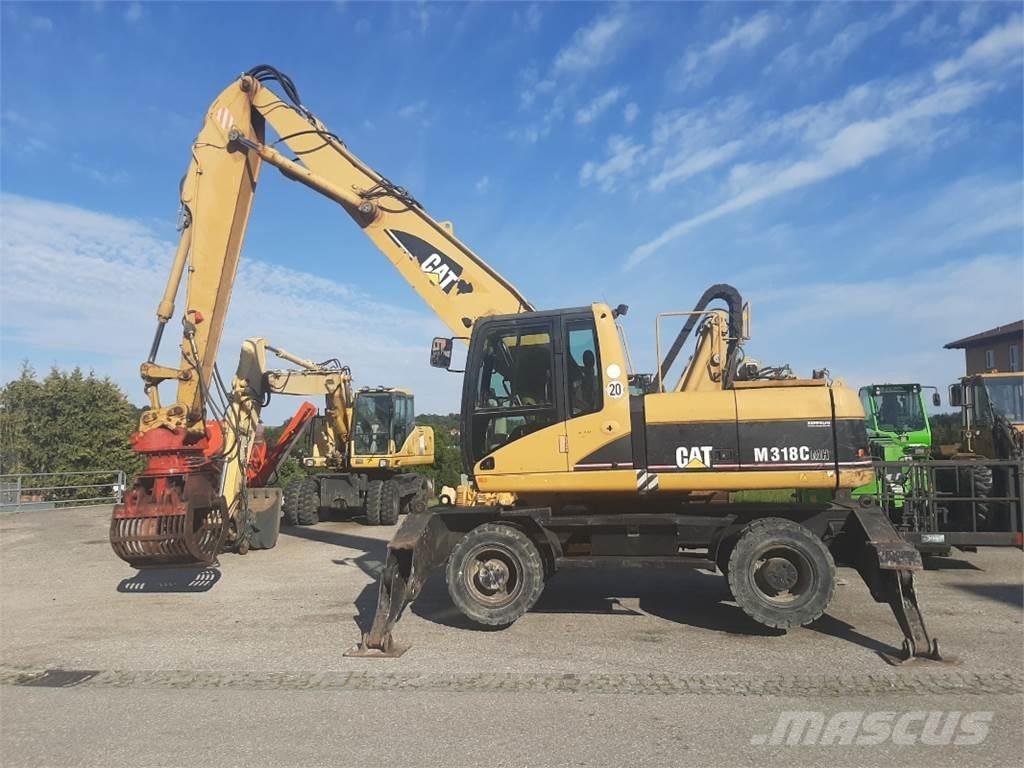 CAT M318C MH Bageri na kotačima