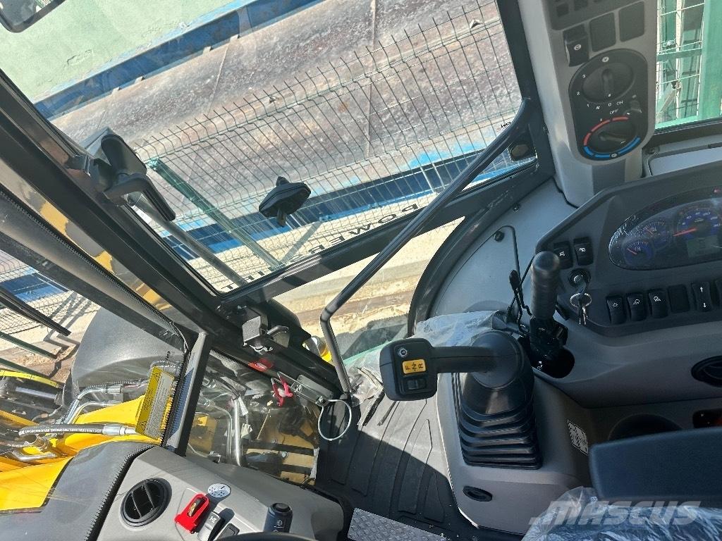 New Holland B 115 B Utovarni rovokopači