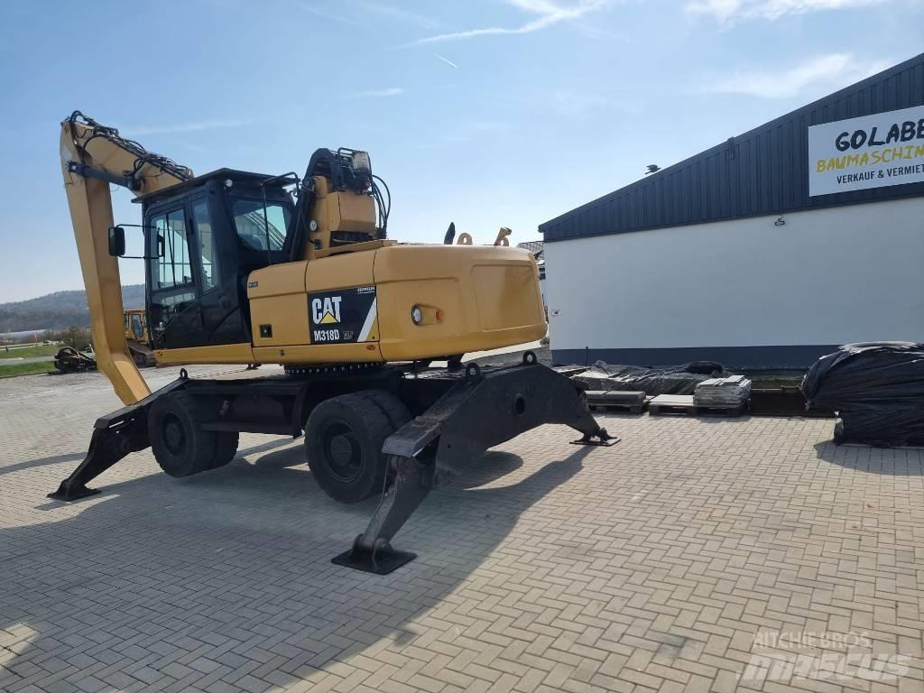 CAT 318D Bageri za manipuliranje materijalom / otpadom