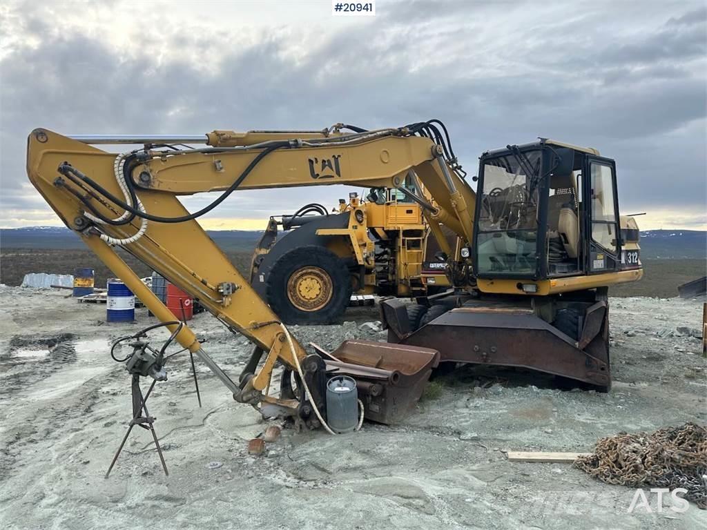 CAT 312 Bageri na kotačima
