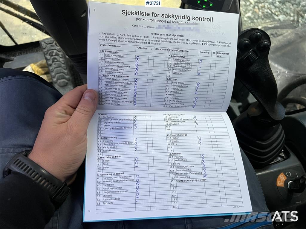 CAT M318F Bageri na kotačima