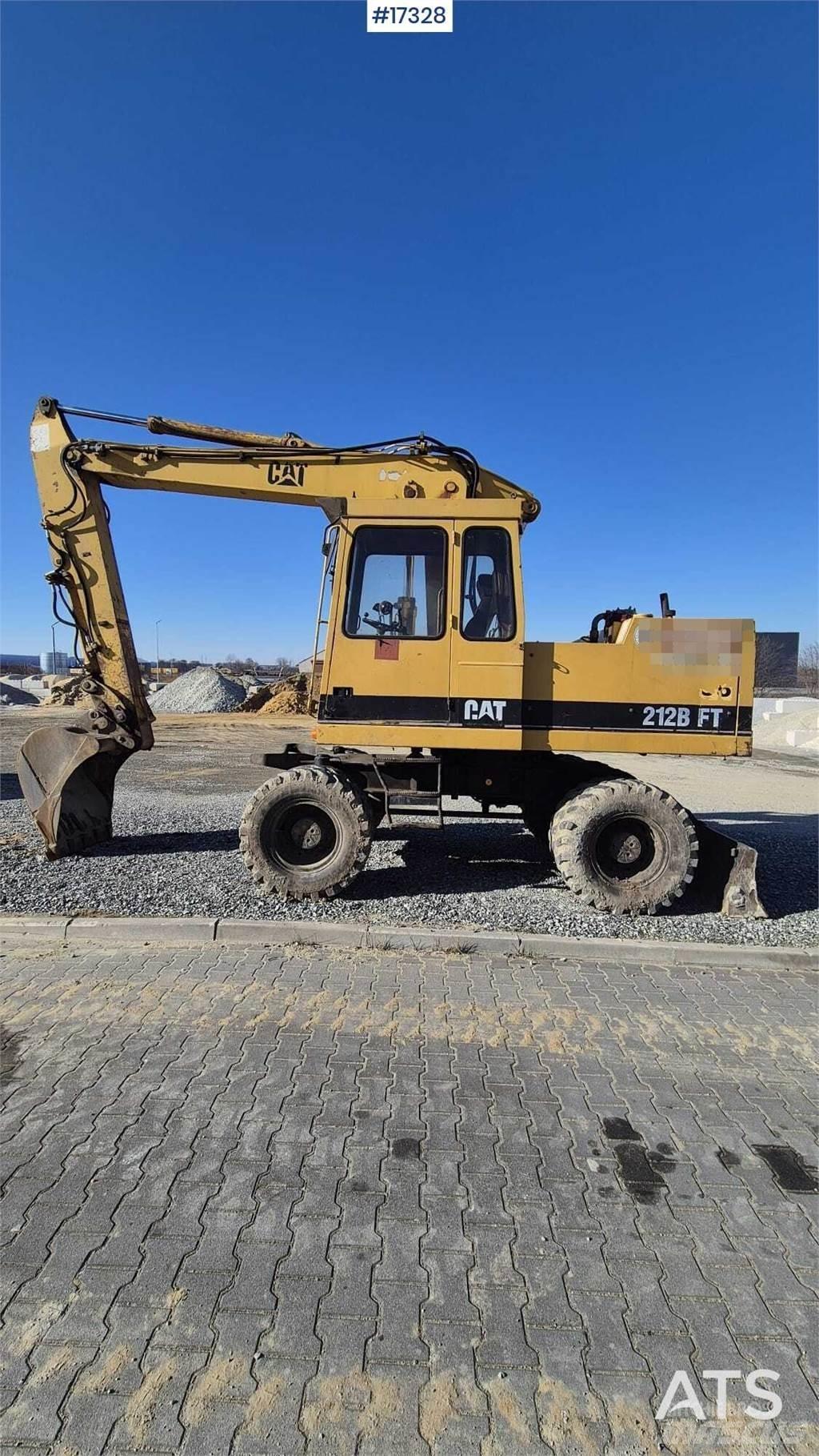 CAT 212BFT Bageri na kotačima