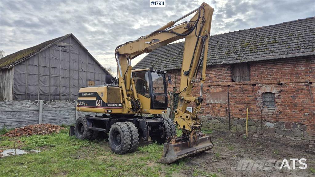 CAT M312 Bageri na kotačima