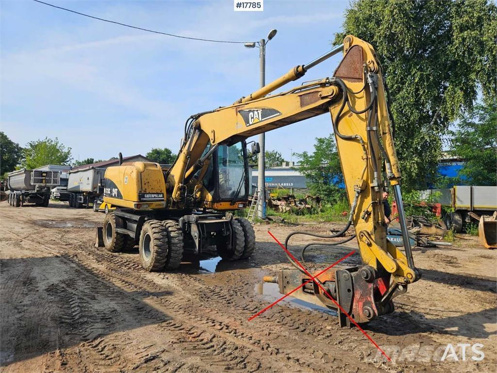 CAT M313 C Bageri na kotačima