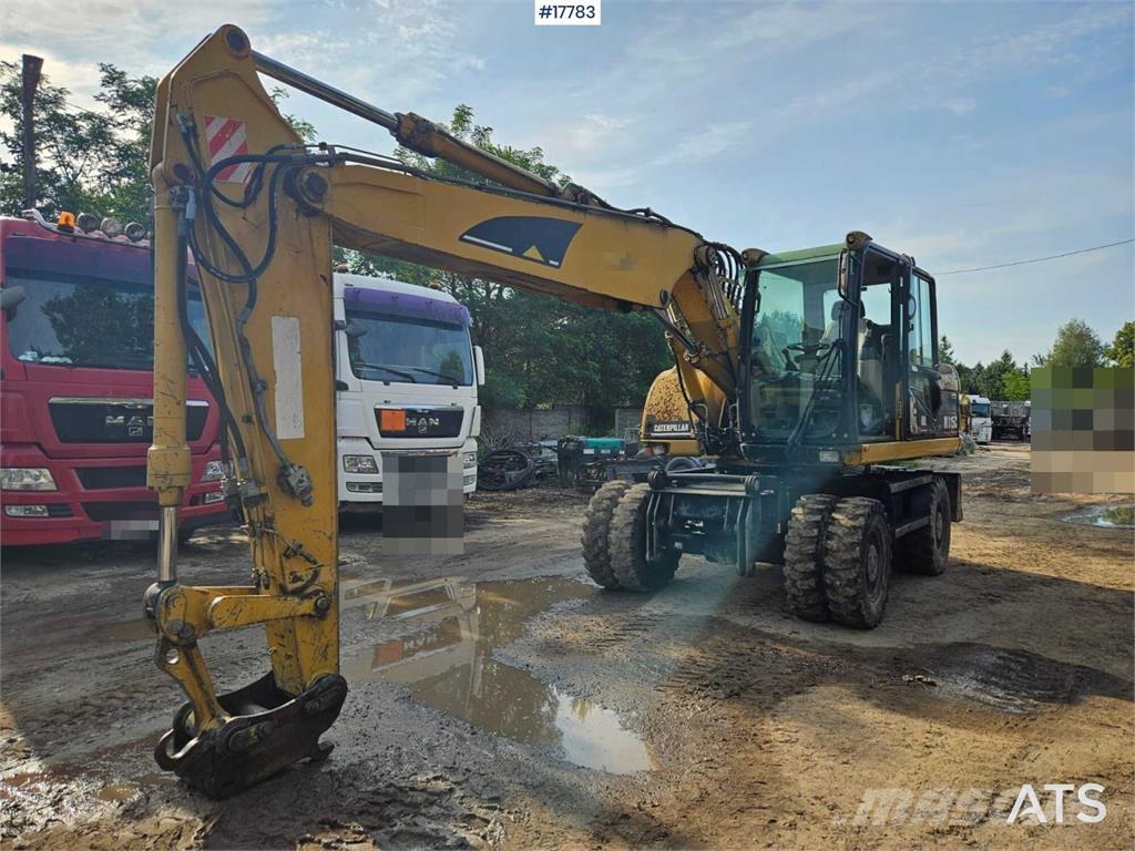 CAT M315C Bageri na kotačima