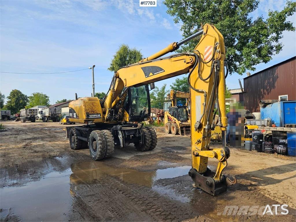 CAT M315C Bageri na kotačima