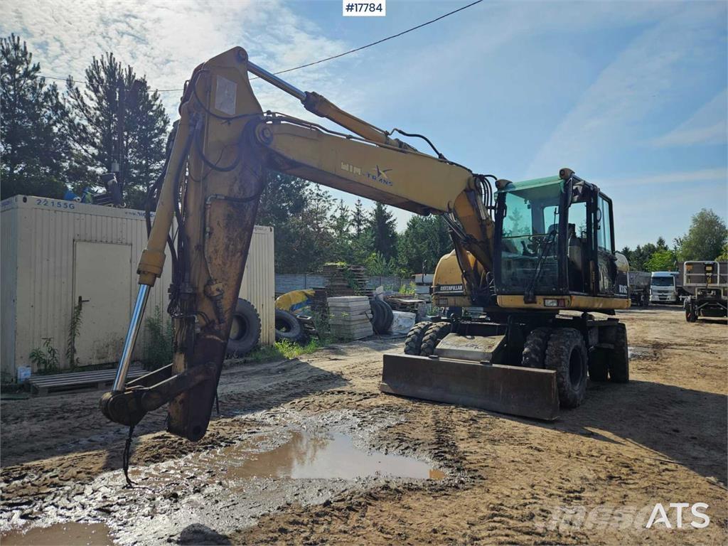 CAT M316C Bageri na kotačima