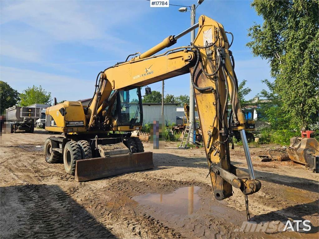 CAT M316C Bageri na kotačima