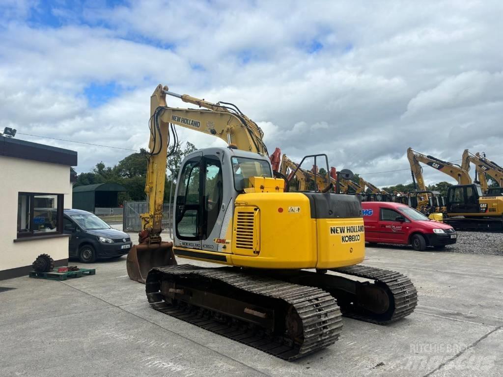 New Holland E 135 SR Bageri gusjeničari
