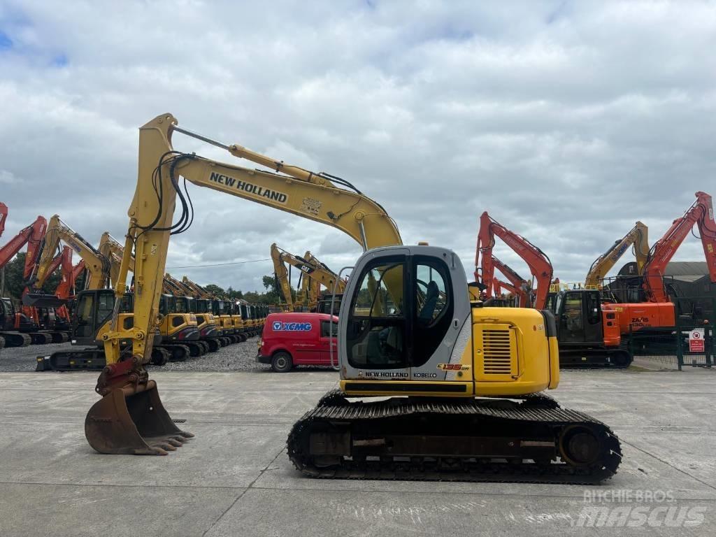 New Holland E 135 SR Bageri gusjeničari