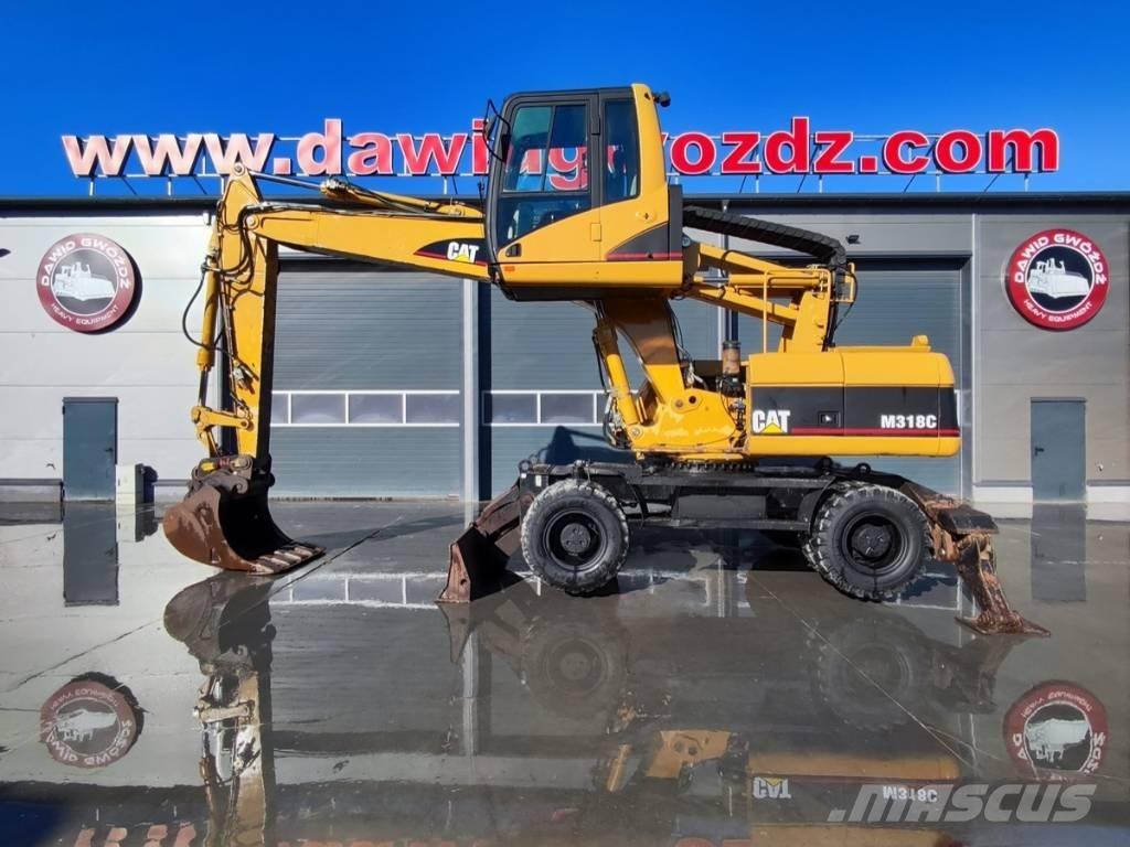 CAT M 318 C Bageri na kotačima