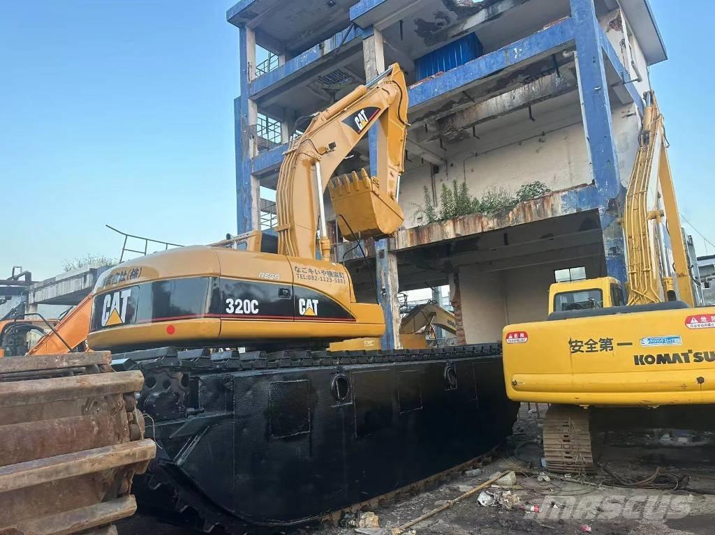 CAT 320 C Amfibijski bageri