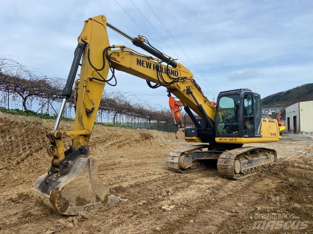 New Holland E245 Bageri gusjeničari