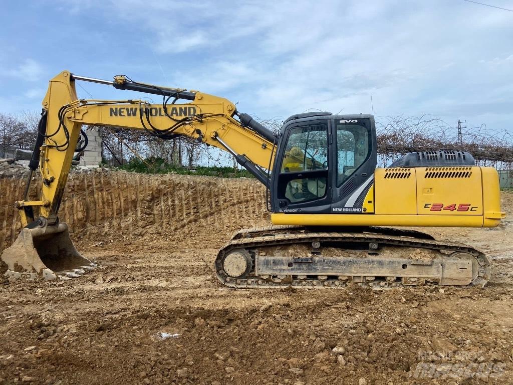 New Holland E245 Bageri gusjeničari