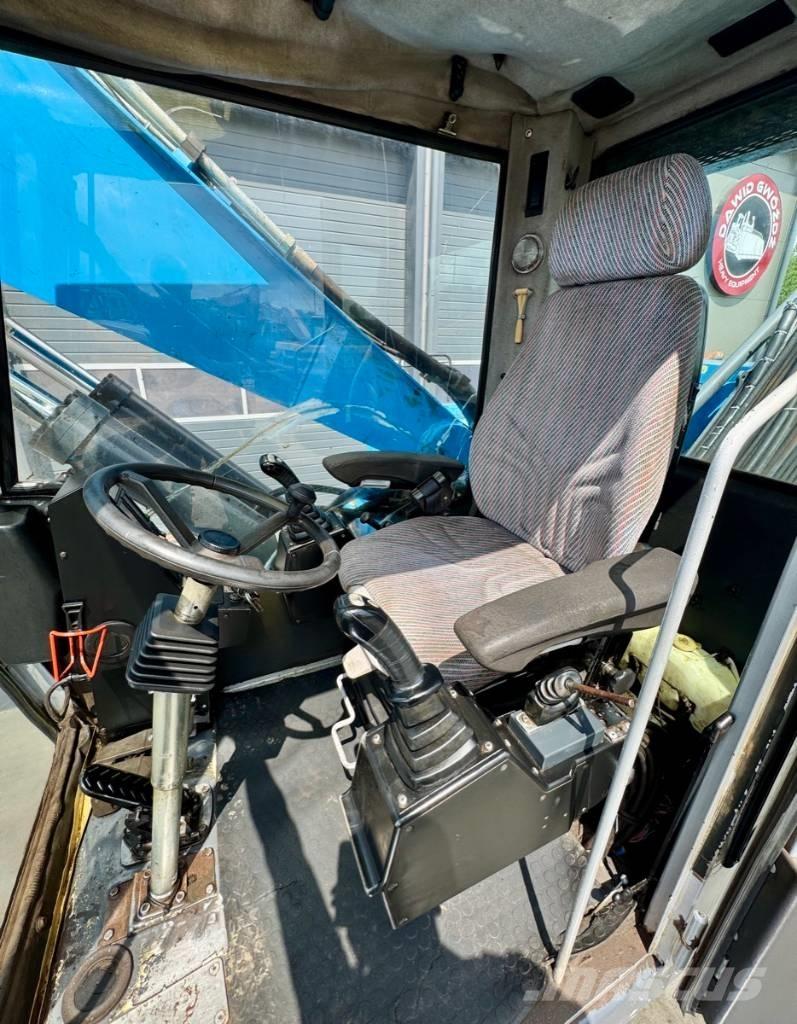Fuchs MHL 331 Bageri za manipuliranje materijalom / otpadom