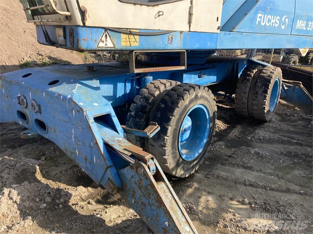 Fuchs MHL 331 Bageri za manipuliranje materijalom / otpadom