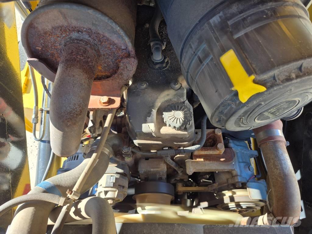 New Holland B 95 B Utovarni rovokopači