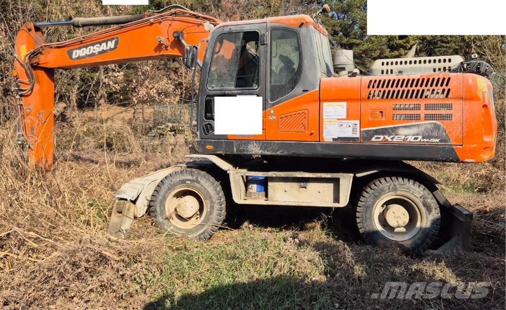 Doosan DX 210 W Bageri na kotačima