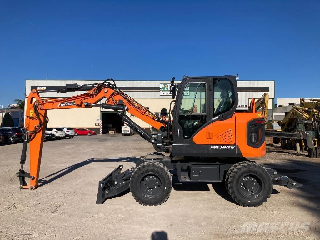 Develon DX 100 W-7 Bageri na kotačima