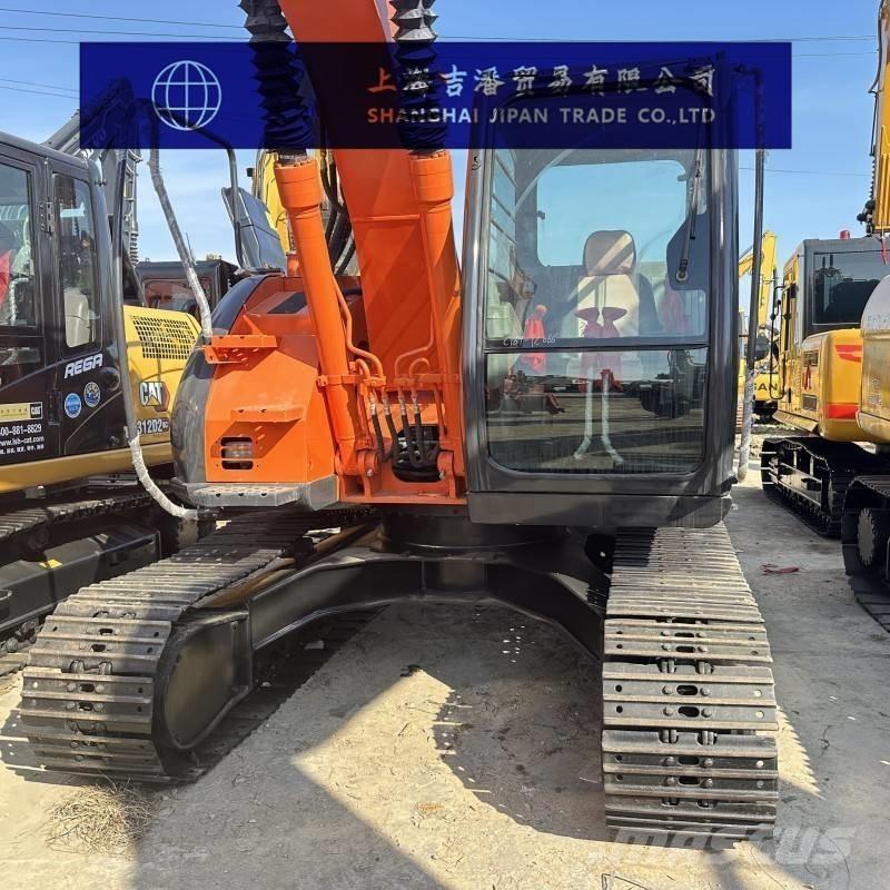 Hitachi ZX 135 Bageri gusjeničari
