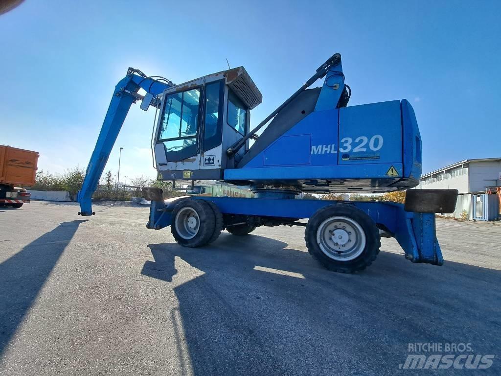 Fuchs MHL 320D Bageri za manipuliranje materijalom / otpadom