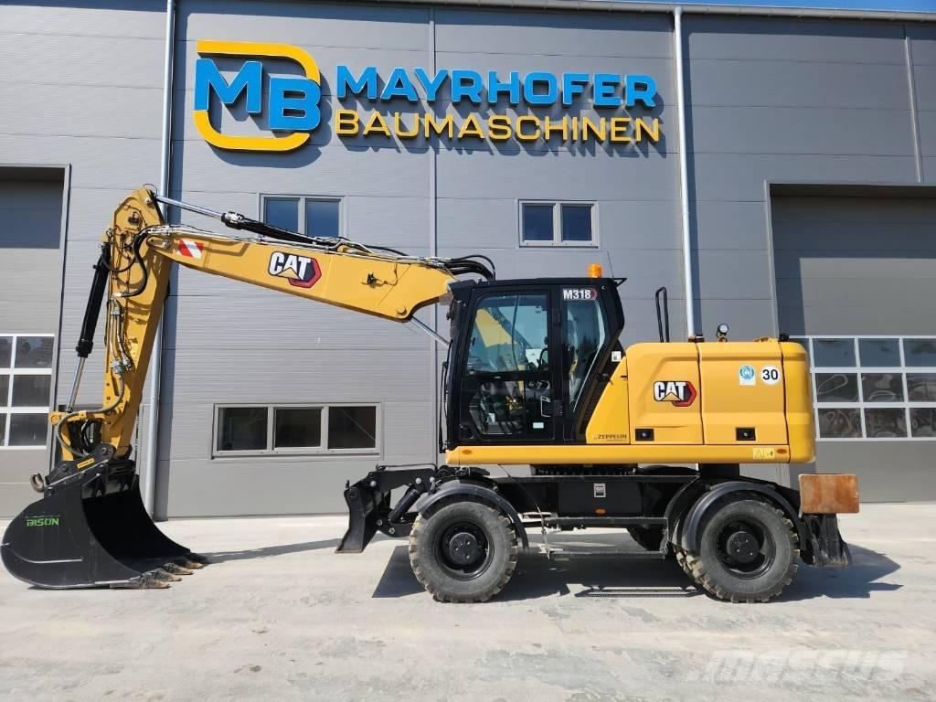 CAT M 318 Bageri na kotačima
