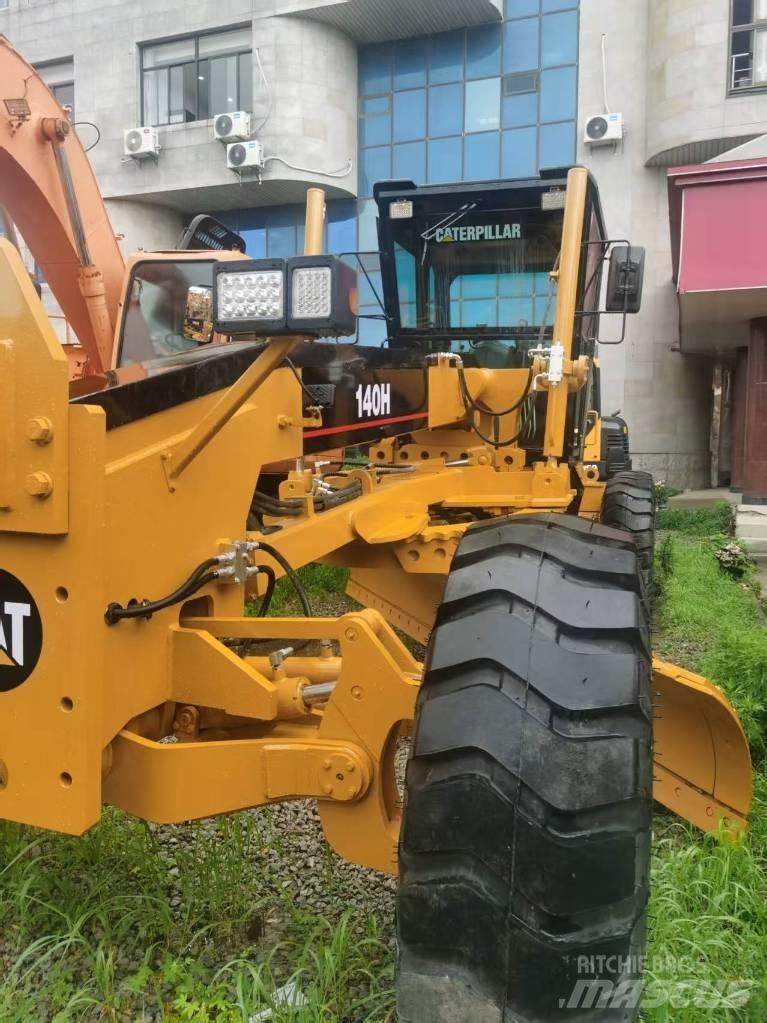 CAT 140 H Utovarni rovokopači