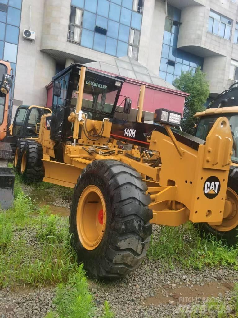CAT 140 H Utovarni rovokopači