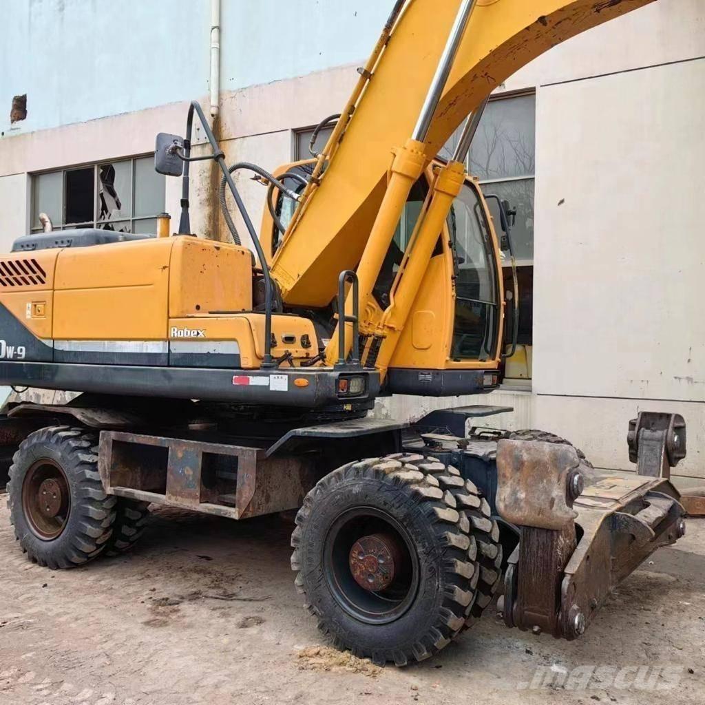 Hyundai 210-9 Bageri sa prednjom lopatom