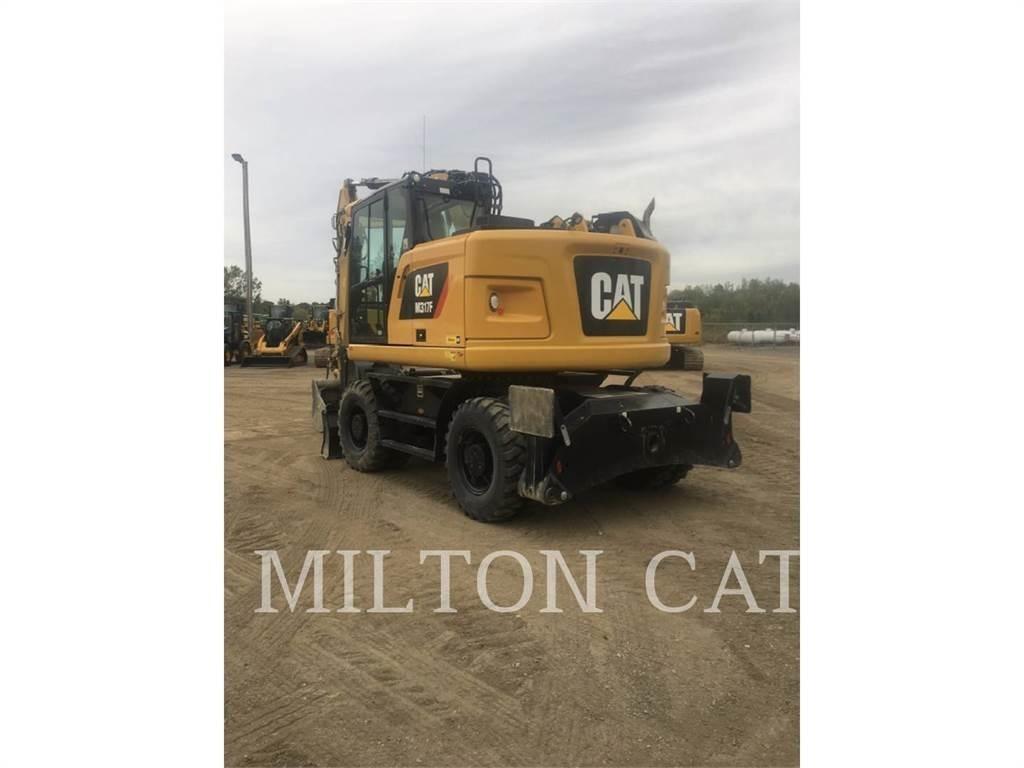 CAT M317F Bageri na kotačima