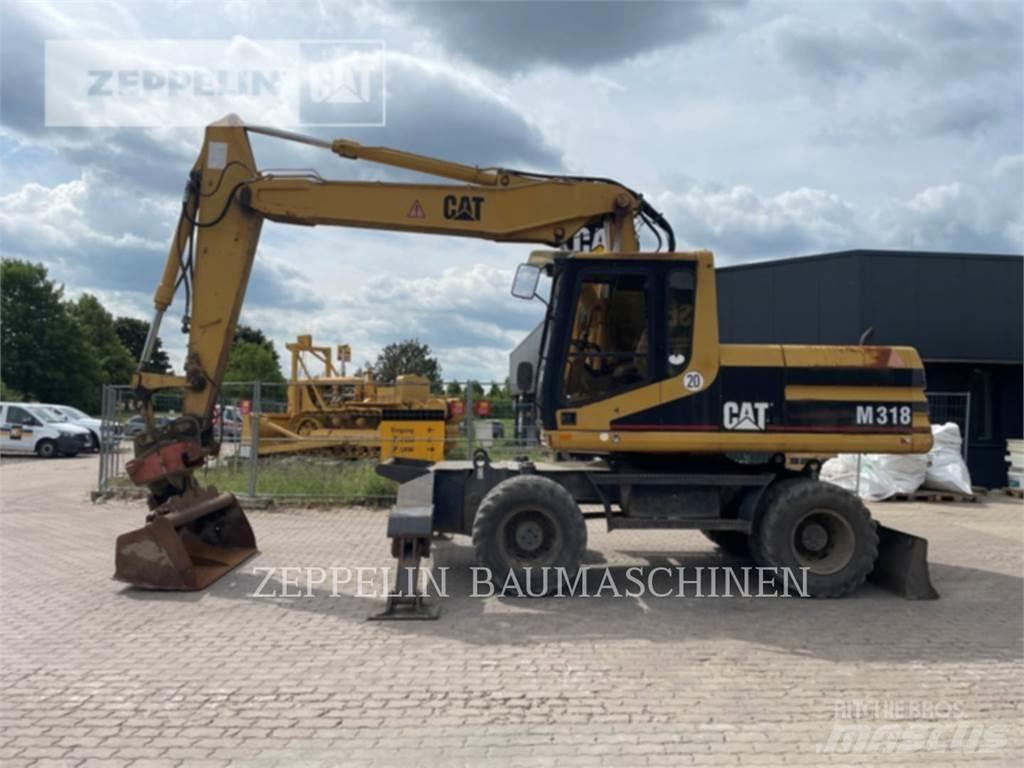 CAT M318 Bageri na kotačima